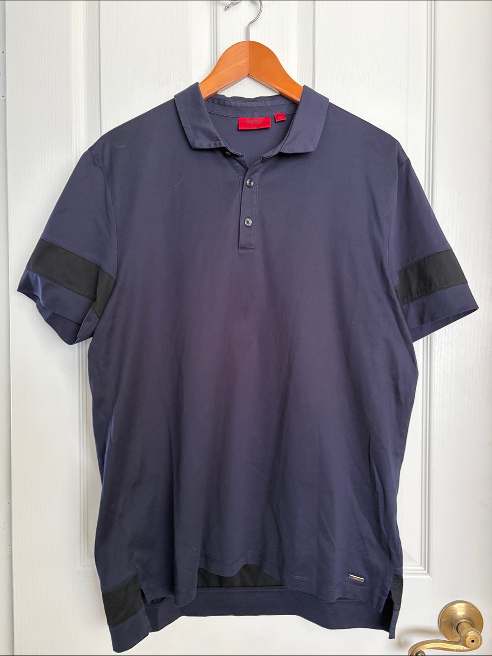 HUGO Navy Polo with Black Sleeve and Waist Bands.  Golf Polo